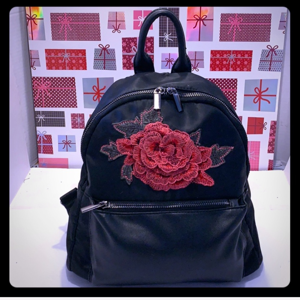 GentlyUsed KISS ME Couture Black Mini Backpack